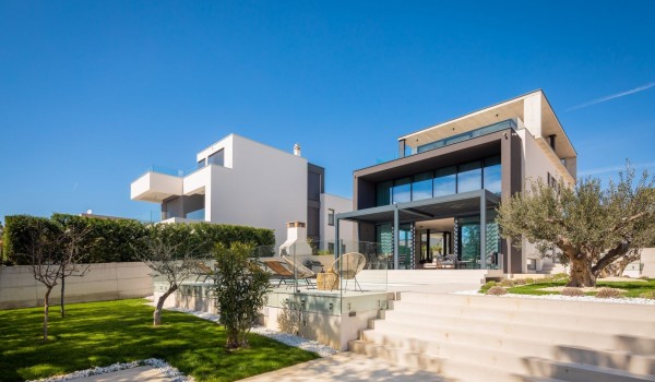 Front of the Luxury Villa Idria Sea and View with lovely garden, private heated hydro massage pool, patio, balcony and a terrace with electronic pergola system