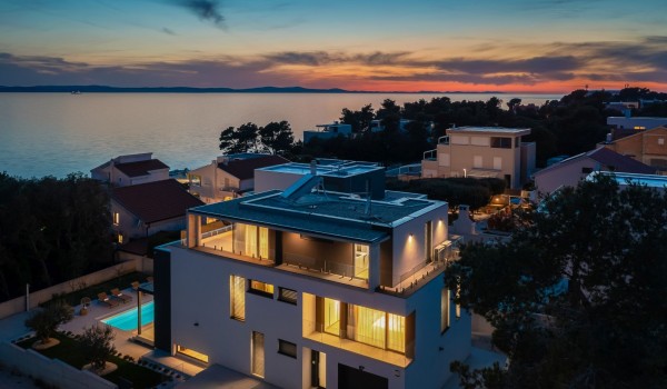 Aerial sunset view on the property of Villa Idria with the private heated pool