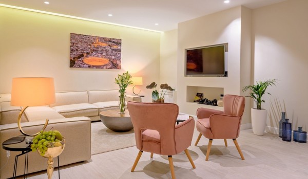 Airy living room with corner furniture and sofas in a private luxury holiday villa on Šolta with concierge service