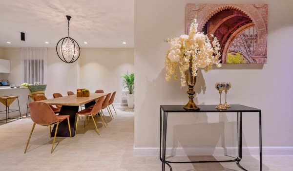 A view of the elegant dining room with table and chairs with chef service available upon request at Raquel beach villa with pool in Šolta