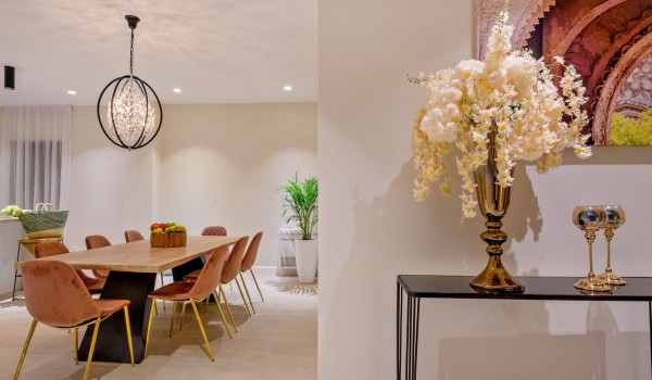 Luxury dining room with table and chairs of a private holiday villa with a swimming pool  and concierge service on the island of Šolta