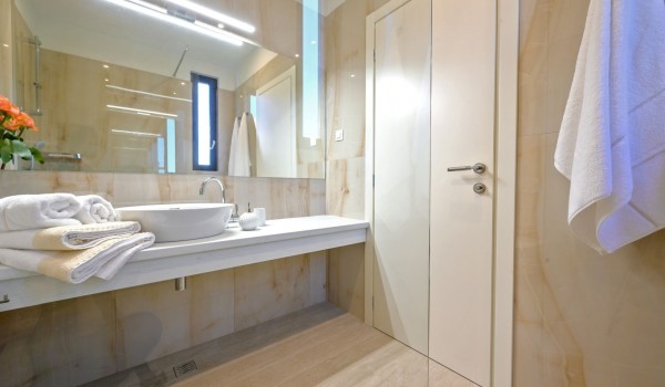 Private bathroom with towels and sink in private luxury  villa for rent with swimming pool by the sea Raquel in Šolta with Internet, SMART TV and private parking