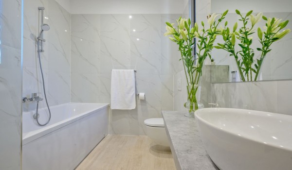 Elegant bathroom with bathtub, toilet and sink in the luxury villa for rent Raquel by the sea on the island of Šolta