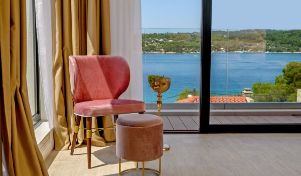 View of the sea from the bedroom of a private villa Raquel with private parking and gym for rent and holiday with a swimming pool by the beach on the island of Šolta