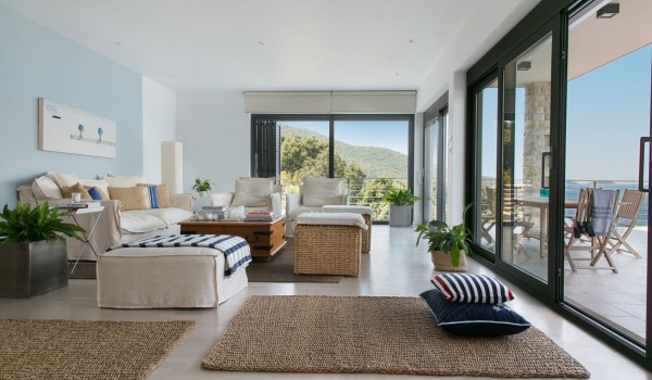 Living room with comfortable sofas and sea view in a luxury villa Korcula Beach Retreat in Croatia