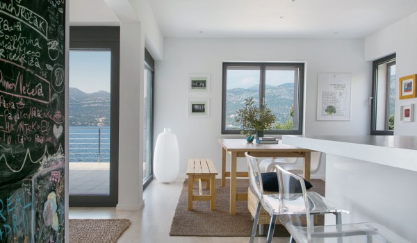 Wooden dining table in a luxury Croatian villa for vacation with friends on Korcula island