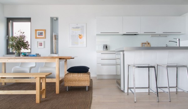 Dining table and elegant kitchen in a luxury pool villa for romantic vacation on Korcula island