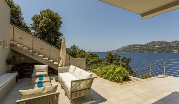 Outdoor seating area  on the terrace of a luxury vacation villa Korcula Beach Retreat