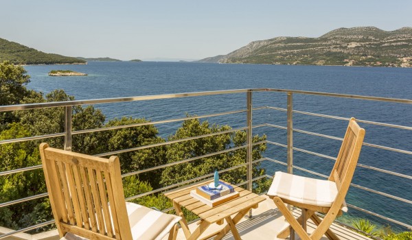 Outdoor seating area  on the terrace of a luxury vacation villa Korcula Beach Retreat