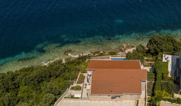 Aerial view of a luxury seafront villa Korcula Beach Retreat with private pool and parking