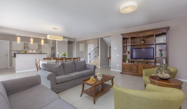 Spacious dining room and living room in Istra luxury private villa for vacation and rent with pool, jacuzzi and sauna.