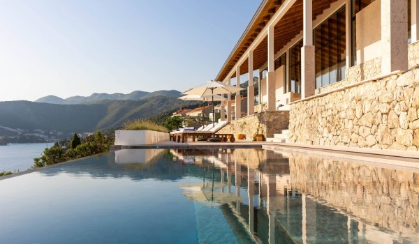 Infinity pool by the sea in Dubrovnik luxury private villa for romantic vacation.