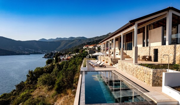 Infinity pool by the sea in Dubrovnik luxury private villa for romantic vacation.
