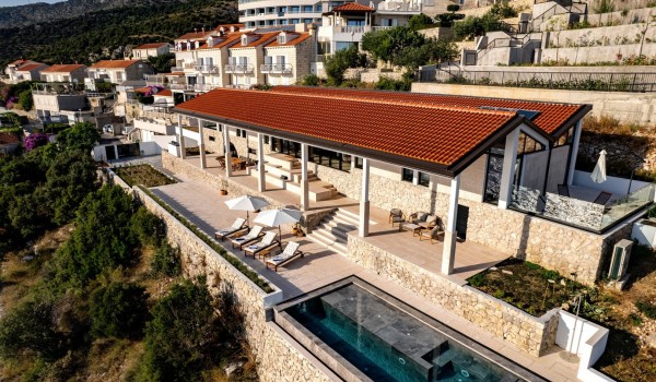 Daily view of luxury romantic villa Crystal Palace in Dubrovnik with infinity pool for vacation and rent.