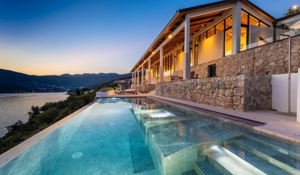 Private infinity pool in Croatia luxury family villa Crystal Palace for vacation and rent.