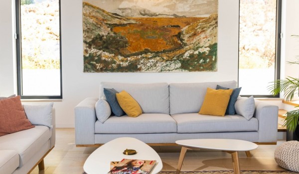Comfortable sofa in living room of luxury Croatian villa Crystal Palace for romantic vacation with pool.