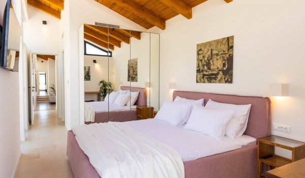 Cozy bedroom with King size bed in Croatian luxury villa Crystal Palace in Dubrovnik with total privacy.