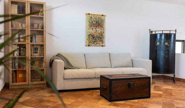 Cozy seating area with sofa in luxury Dalmatian villa Crystal Palace Dubrovnik by the sea for rent.