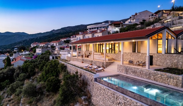 Night picture of luxury Croatian villa Crystal Palace in Dubrovnik for family vacation with pool.