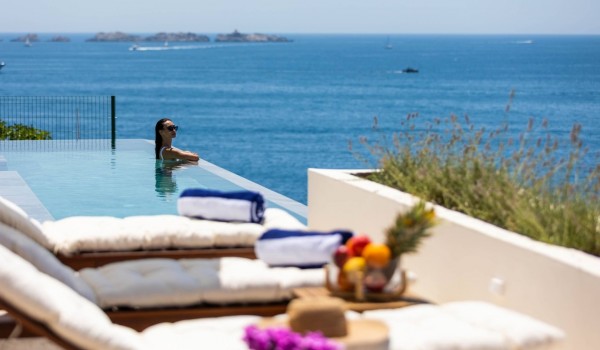 Sunbathing area near private pool in luxury Dalmatian rental villa Crystal Palace by the sea.