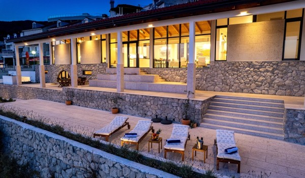 Night picture of luxury Croatian villa Crystal Palace in Dubrovnik with infinity pool for romantic vacation.