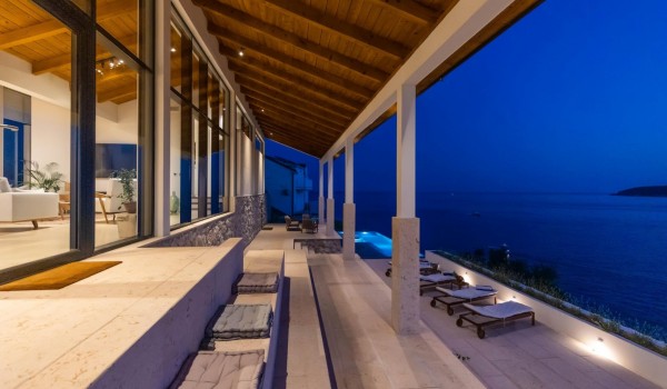 Seating area on terrace of Croatia luxury rental villa Crystal Palace with pool by the sea.