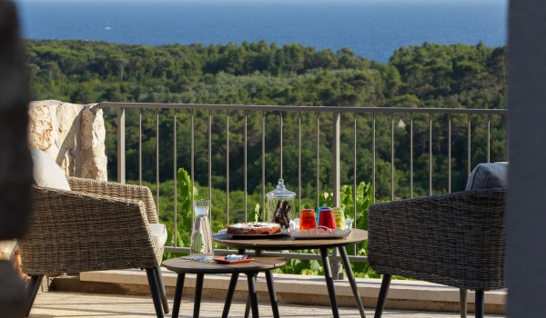Lounge area on the private balcony of the luxurious family villa Aromatica in Dubrovnik on Sipan island for vacation and rent