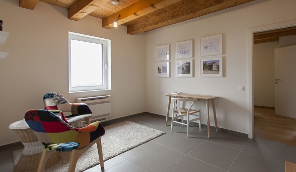 Lounge room area with the work desk and reading corner in the luxury family villa Aromatica in Dubrovnik on Sipan island
