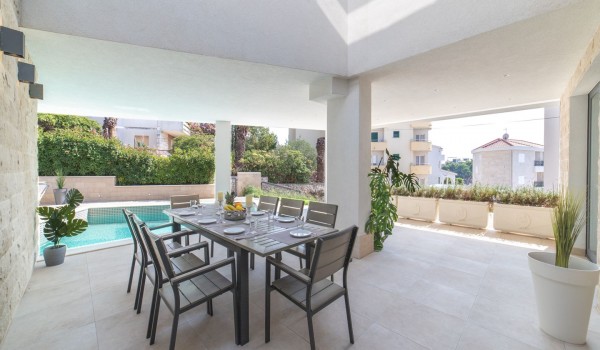 Outdoor dining table on the terrace of a Croatia luxury villa Trogir 3 for vacation and rent on Ciovo