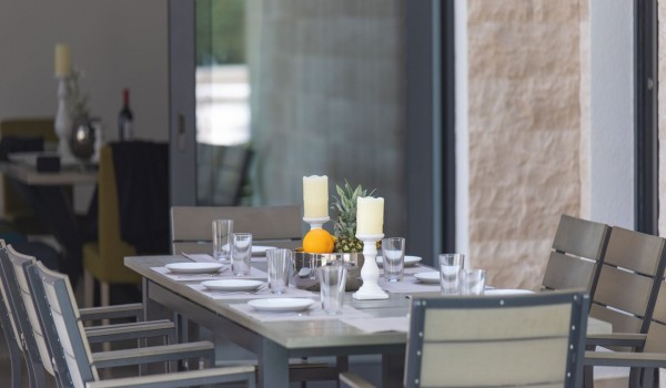 Outdoor dining table on the terrace of a Croatia luxury sea view villa Trogir 3 for vacation and rent on Ciovo