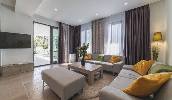 Comfortable sofas in a living room of a Croatia luxury vacation villa with private parking and pool in Trogir