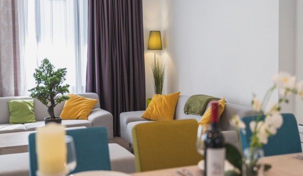 Living room with comfortable sofas and dining table in a Croatia luxury family villa Trogir 3 with private pool and sea view