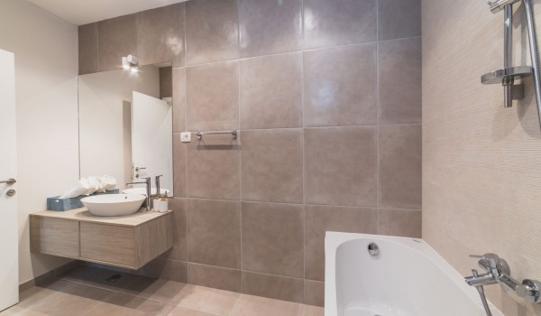 En suite bathroom with bathtub in a Croatia luxury villa Trogir 3 with private parking and sea view