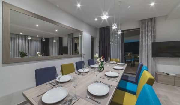 Dining table in a living room of a Croatia luxury vacation villa Trogir 3 with private pool and gym