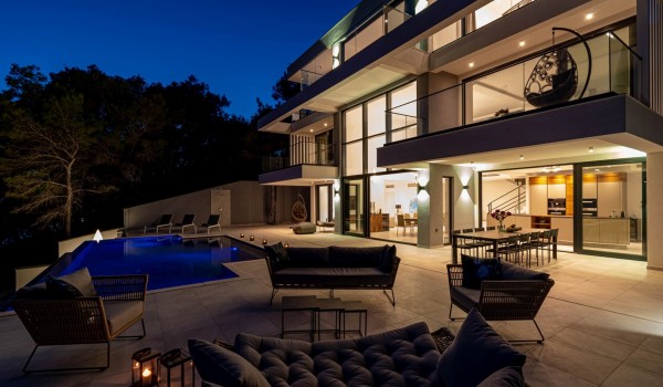 An exterior of the luxury holiday villa for 12 with a private pool, a sun deck with loungers and a longe area on Korcula