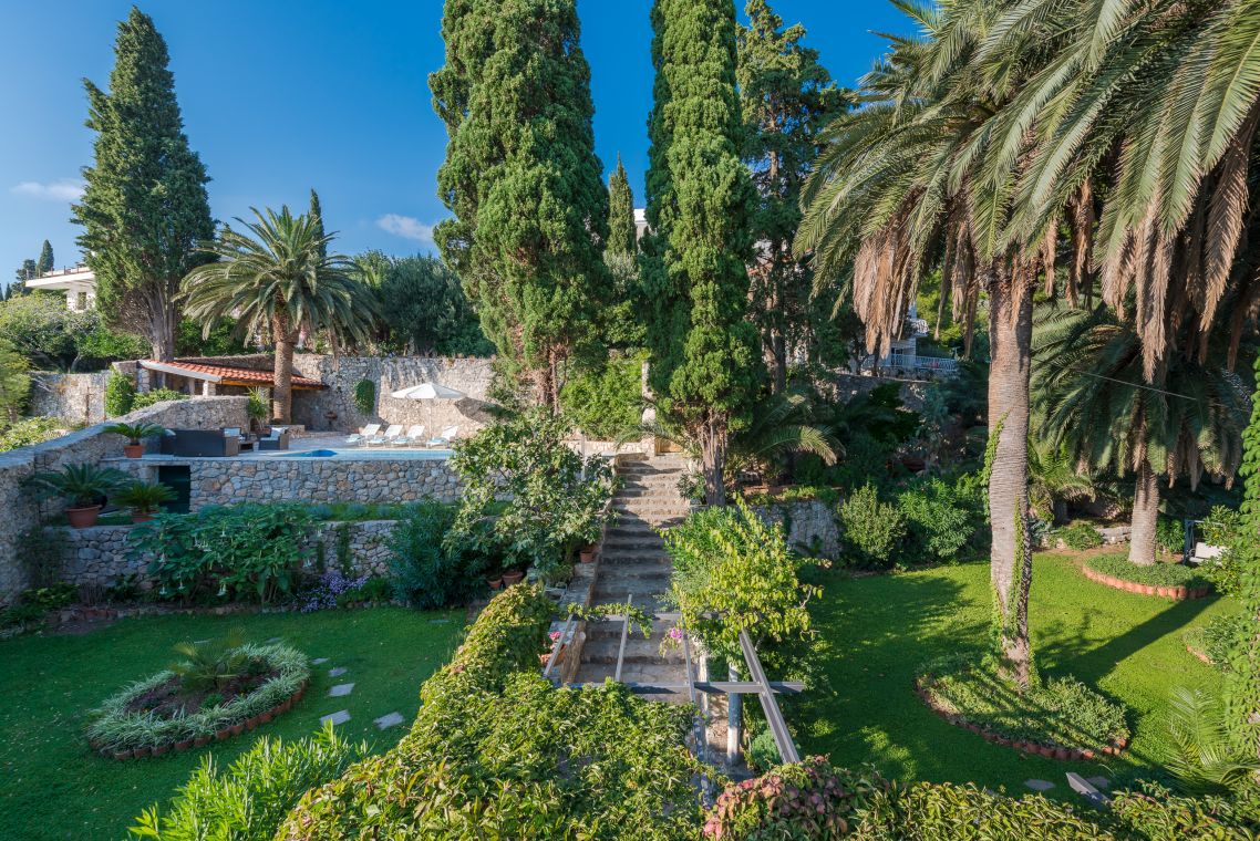 Beautiful mediterranean garden in Croatia luxury holiday house Villa Mlini Dubrovnik for vacation with pool.
