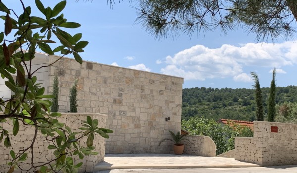 View of the private parking of this Croatia  luxury villa for rent Brač in Sumartin, near pebble beach