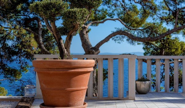 View of the crystal blue sea from the private property of the luxury villa Brač