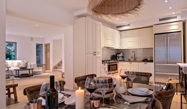 Richly decorated kitchen with living room in a luxury villa for rent and vacation Brač
