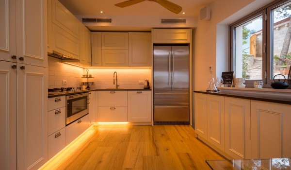 A modern kitchen with LED lights in the famous holiday villa with Wi-Fi , Brač