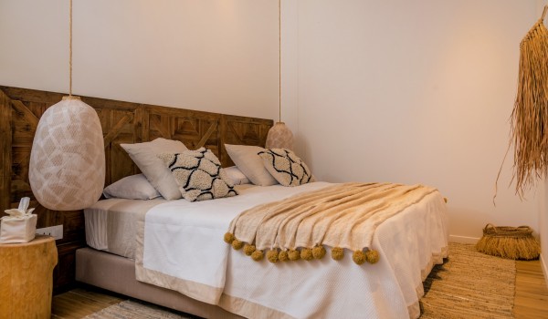 One of the luxurious bedrooms with antique details in a luxurious vacation villa on Brač