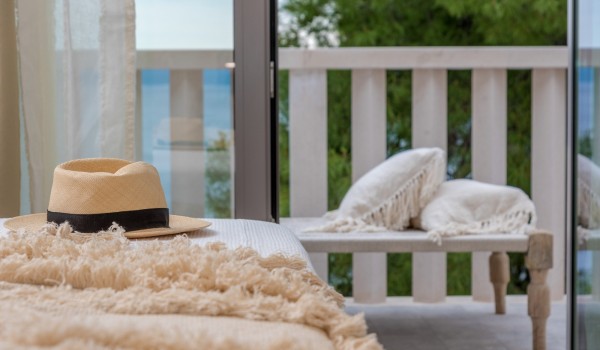 Modern details of the bedroom and outdoor terrace in the Croatia luxury villa Bliss on the island of Brač