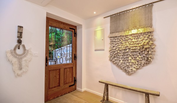 The main entrance of the luxury villa Bliss decorated with numerous details for the best possible atmosphere during your stay
