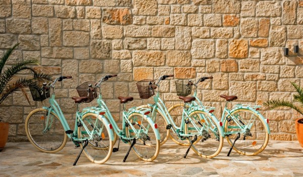 A view of the bicycles on display in front of this luxury holiday villa  for families on the island of Brač