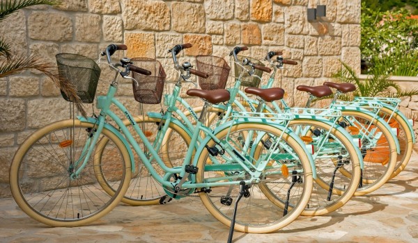 A view of the bicycles on display in front of this Croatia  luxury holiday villa on the island of Brač by the sea