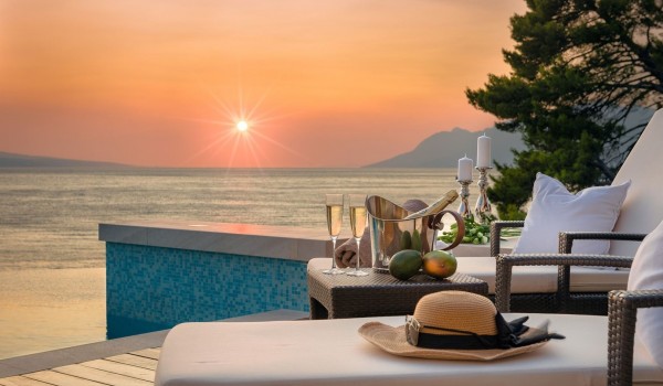 View of the sea and the sunset of the Croatia luxury villa for vacation and rent Brela Pride in Brela with a heated pool by the beach