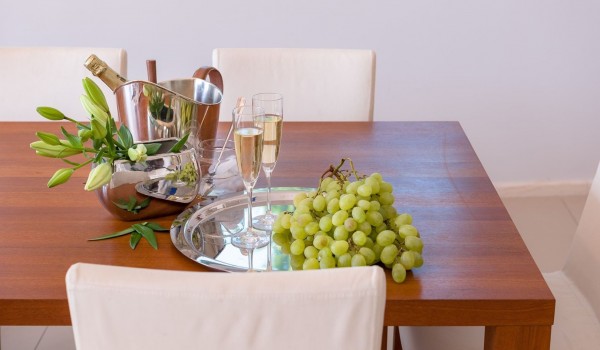 Served drinks in a private family villa for rent and vacation with an infinity pool in Brela by the sea