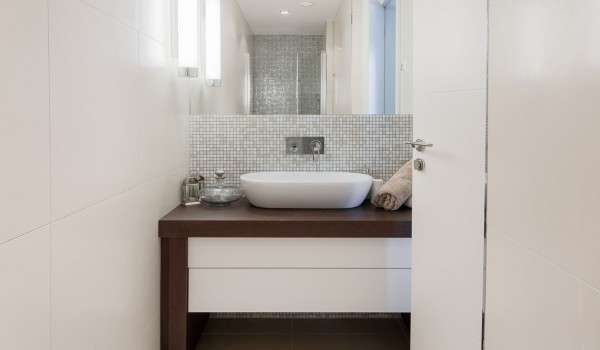 Neutral tones of a luxurious bathroom with a walk-in shower in a Brela Pride family vacation villa by the sea and the beach