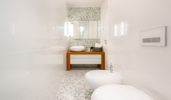 Interior of a private bathroom with a sink, a mirror in the luxury villa Brela Pride with concierge service and private parking in Brela