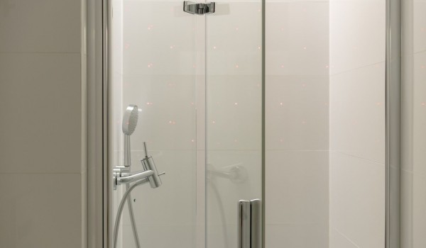 Walk-in shower in the private bathroom of a luxury villa with a pool for rent with family and friends in Brela